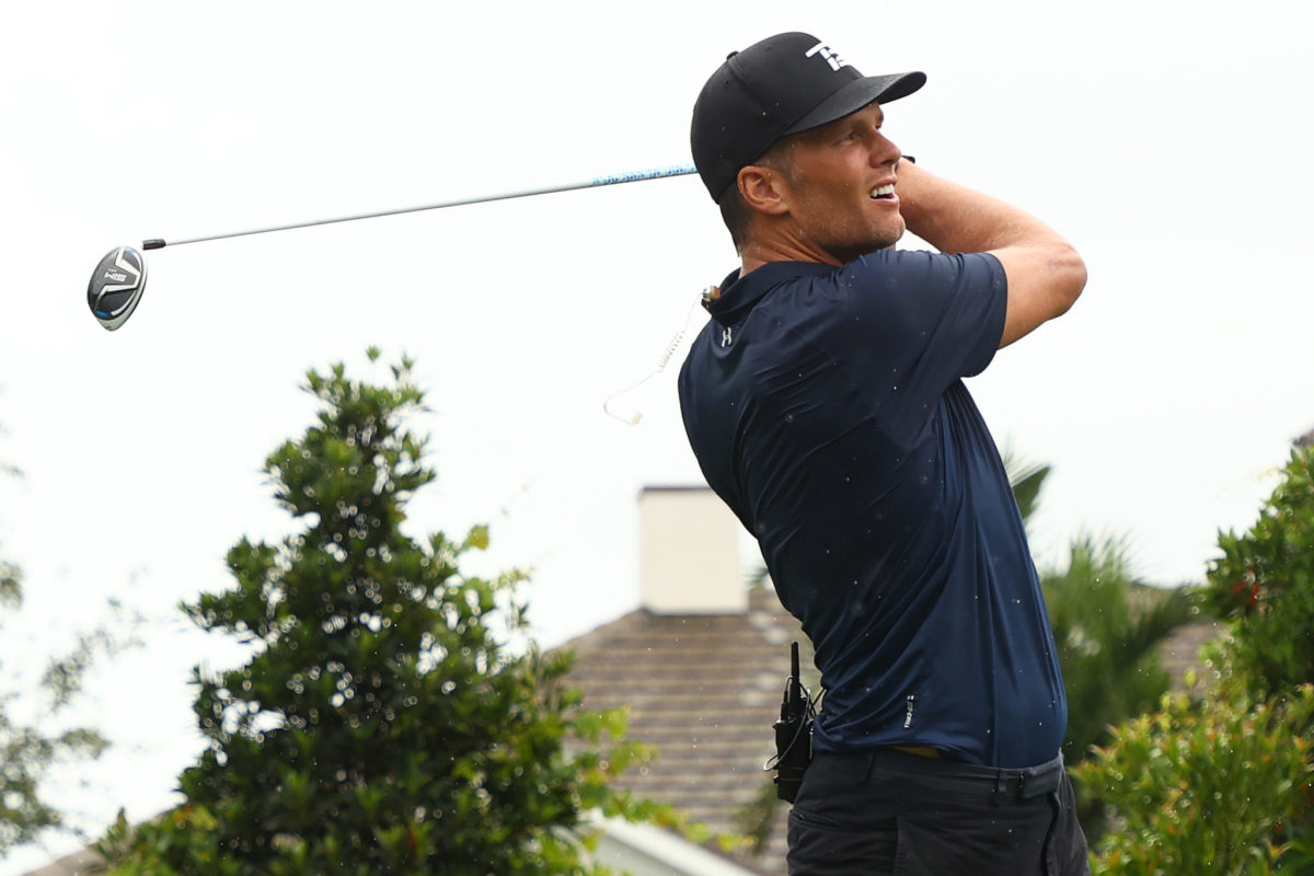 Tom Brady playing golf in The Match.