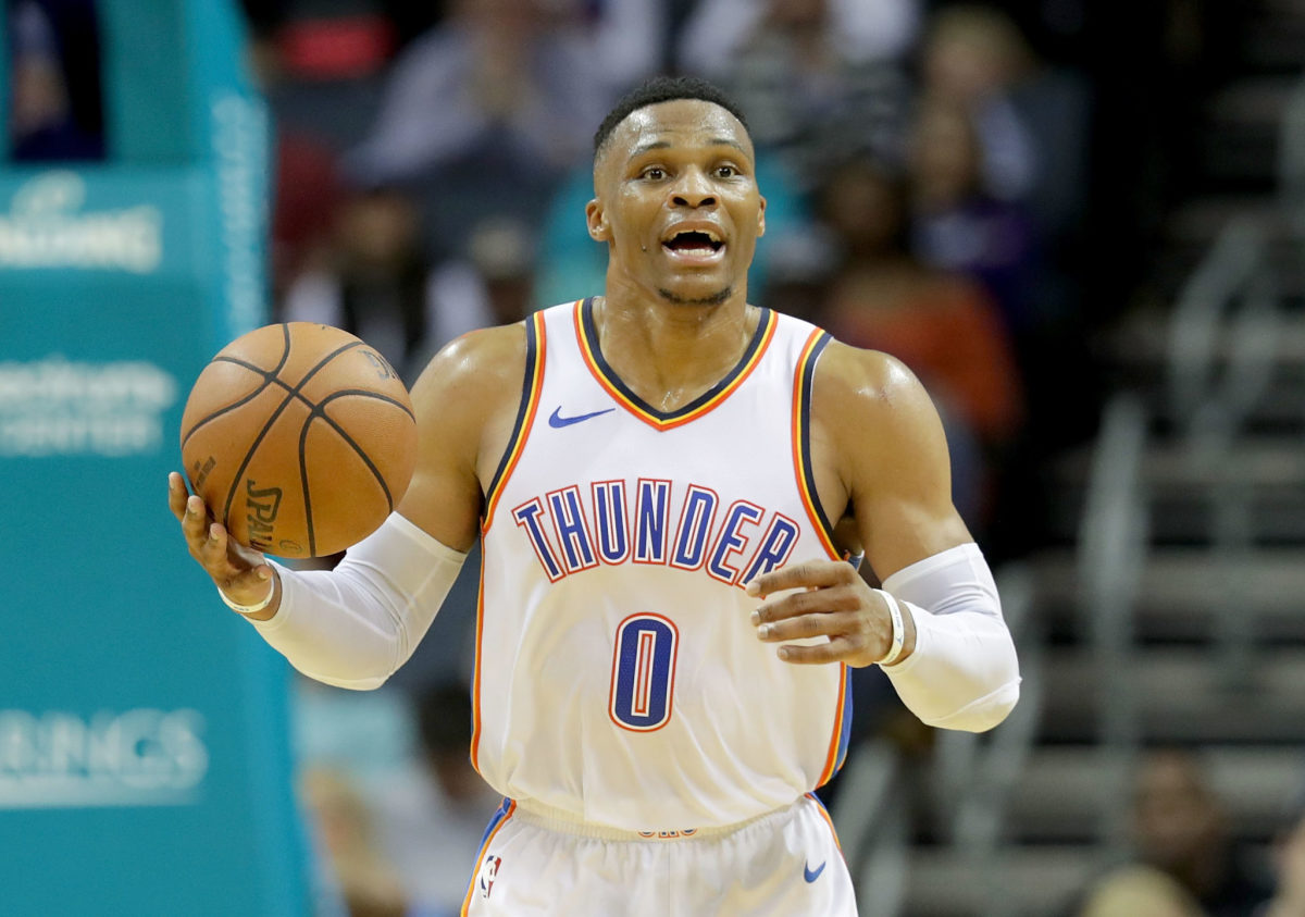 Russell Westbrook dribbles up the court for the Oklahoma City Thunder.