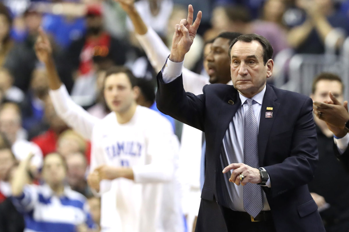 Coach K reacting to play during a Duke game.