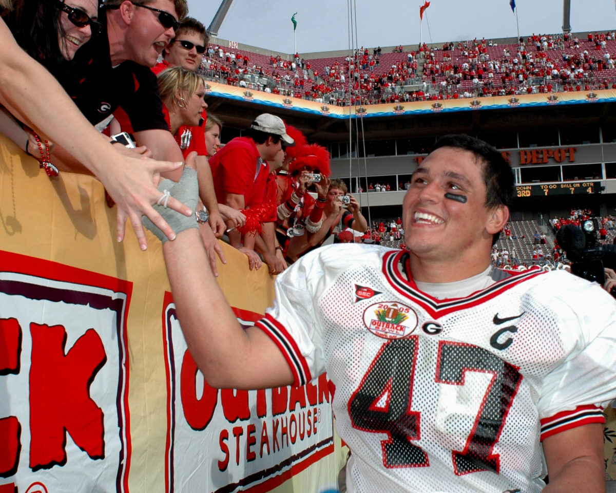 David Pollack shaking hands with Georgia football fans.