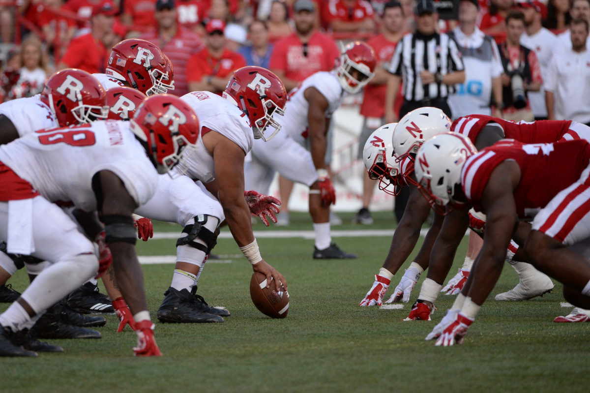 Jonah Jackson and the Rutgers offensive line set to snap against Nebraska.