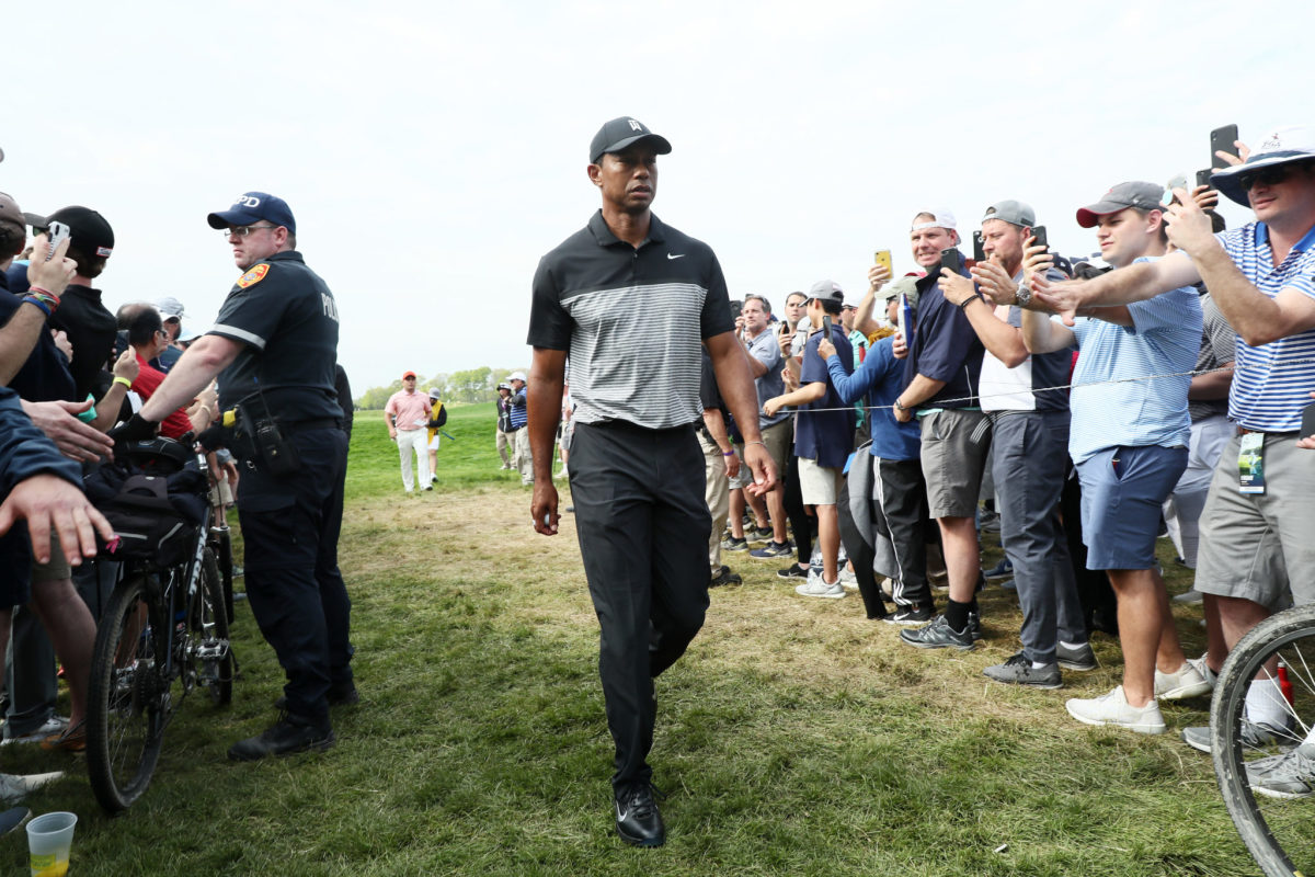 tiger woods walks on the course at the pga championship