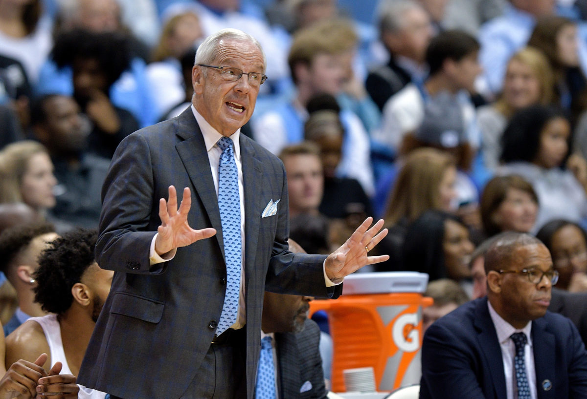 Roy Williams directs his players during a game.