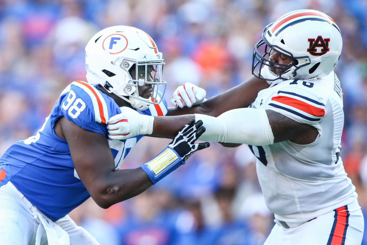 A Florida and an Auburn player battle in the trenches.