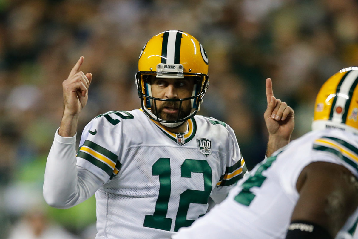 Seattle, WA, USA. 15th Nov, 2018. Green Bay Packers quarterback Aaron  Rodgers (12) stands back in the pocket while the Hawks Nest looms in the  distance during a game between the Green