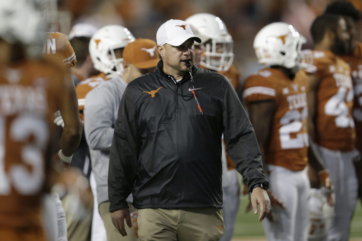 Tom Herman pacing up and down Texas' sideline.