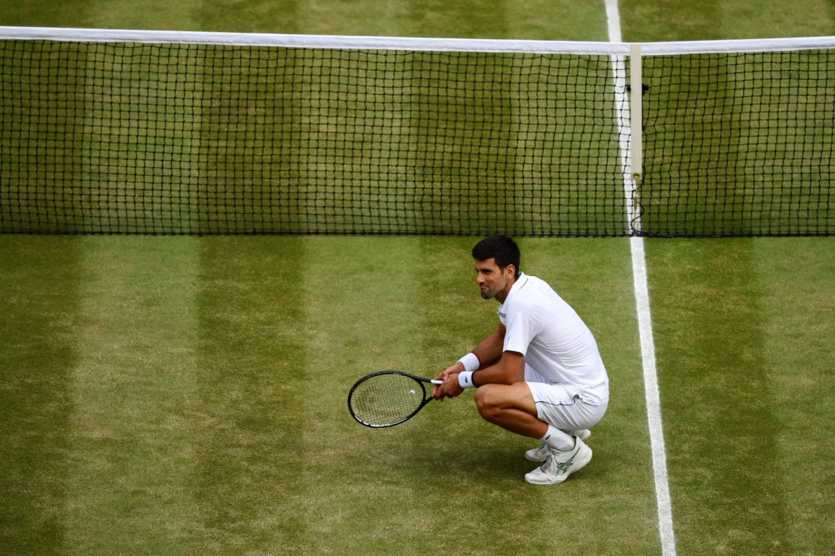 Novak Djokovic celebrates his title at Wimbledon.