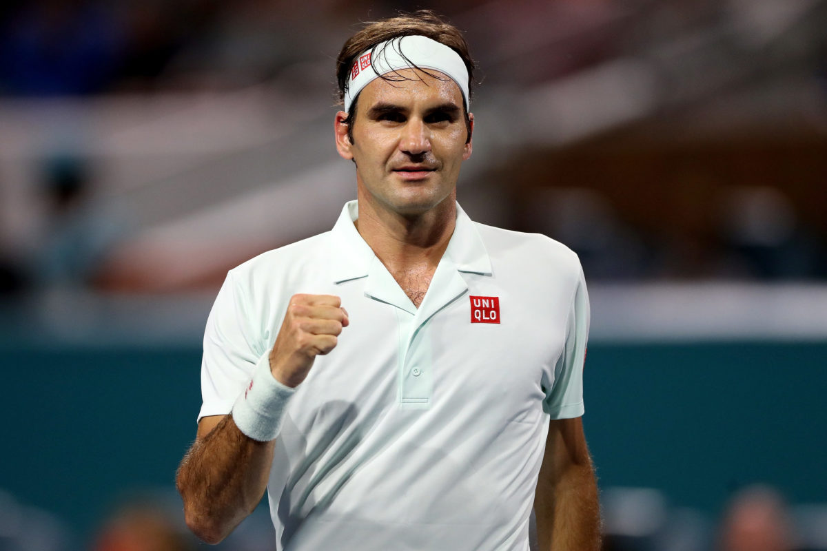 Roger Federer pumping his fist.