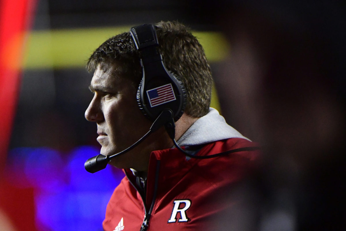 A closeup of Rutgers head coach Chris Ash during a football game.