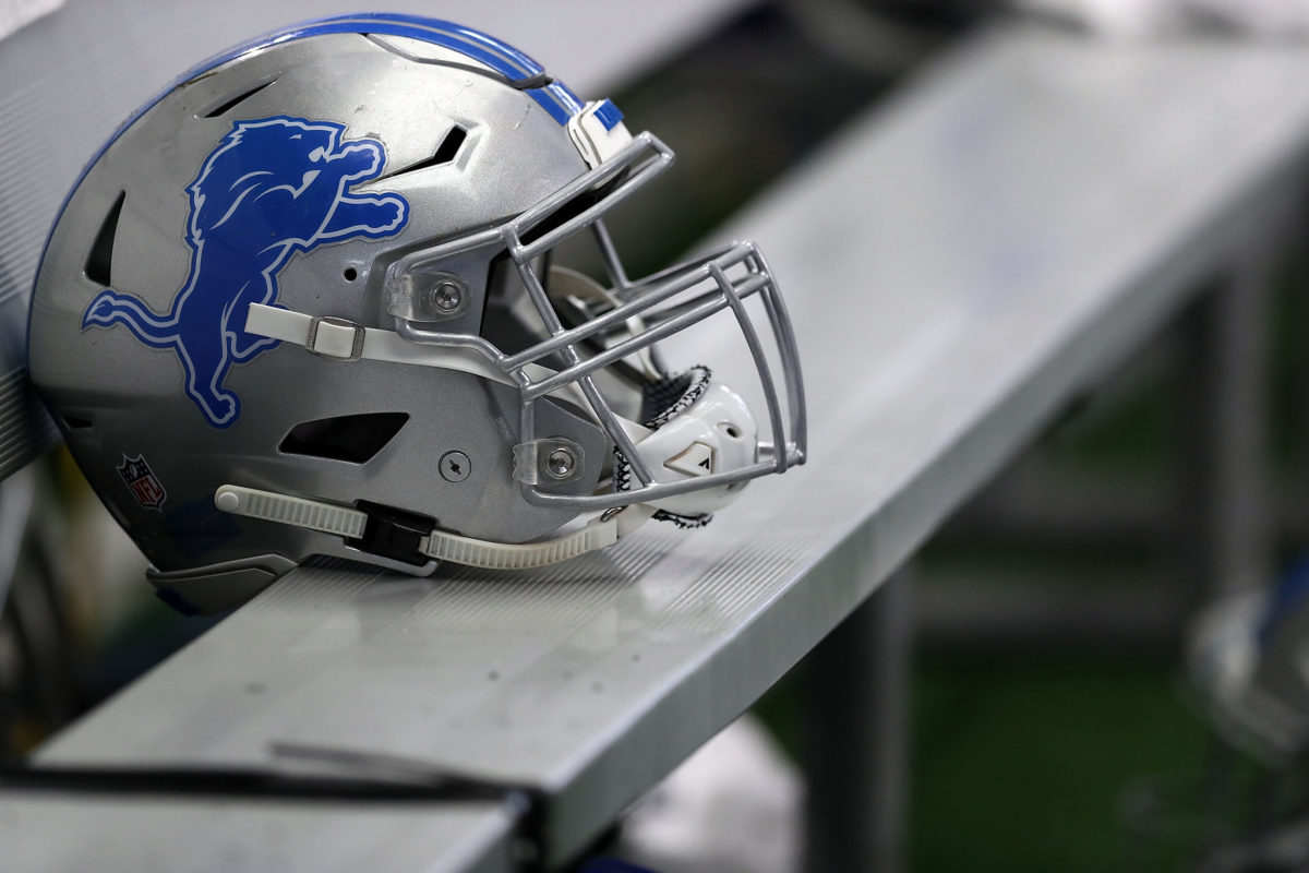A closeup of a Detroit Lions helmet.