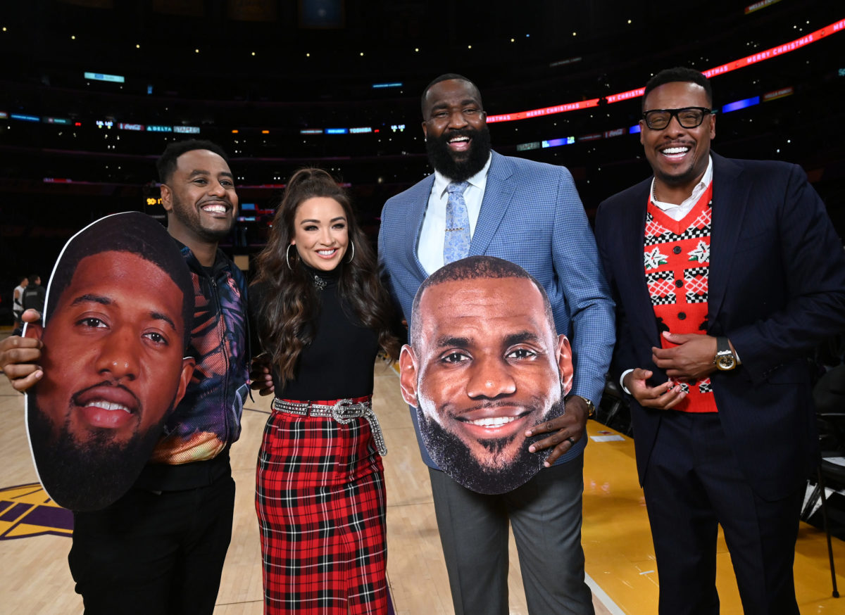 Kendrick Perkins on the court with his ESPN colleagues before an NBA game.