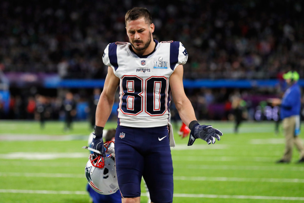 Danny Amendola walking off the field with his helmet off.