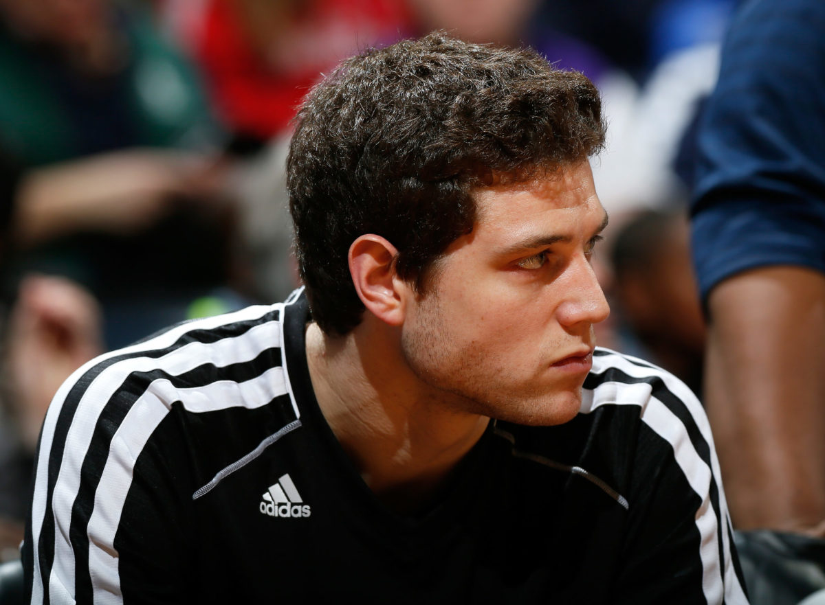 jimmer fredette looks onto a court