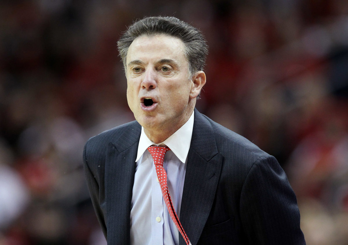 Rick Pitino of Louisville yells at his players during a game.