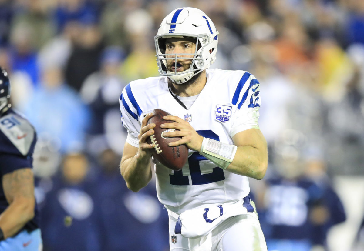 Colts quarterback Andrew Luck talks with media