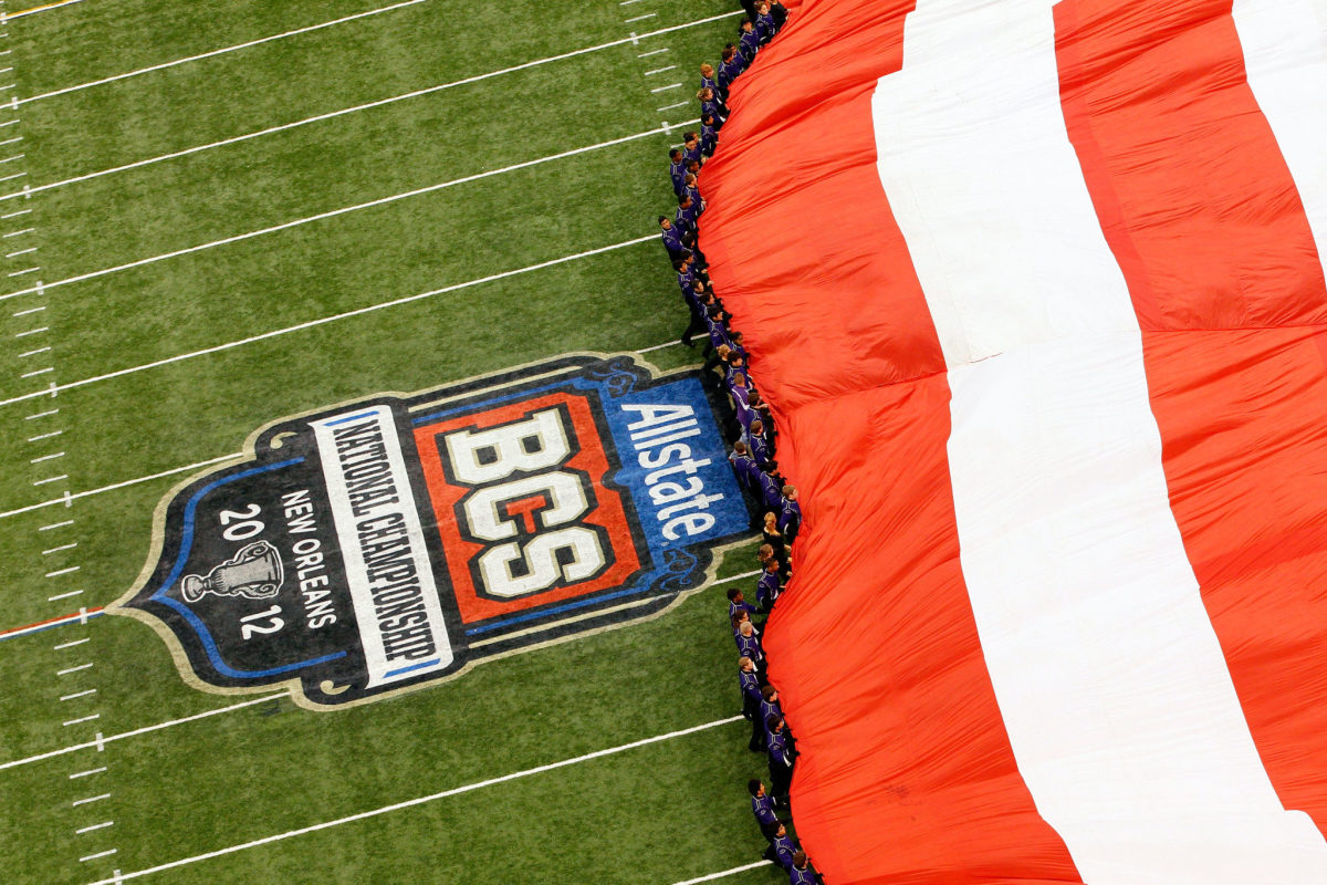A shot of an American flag and the BCS title game logo.