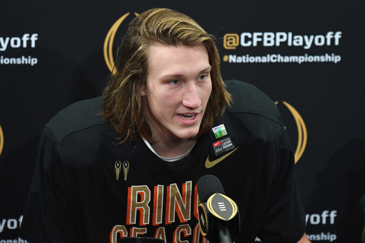 A closeup of Trevor Lawrence speaking to the media.