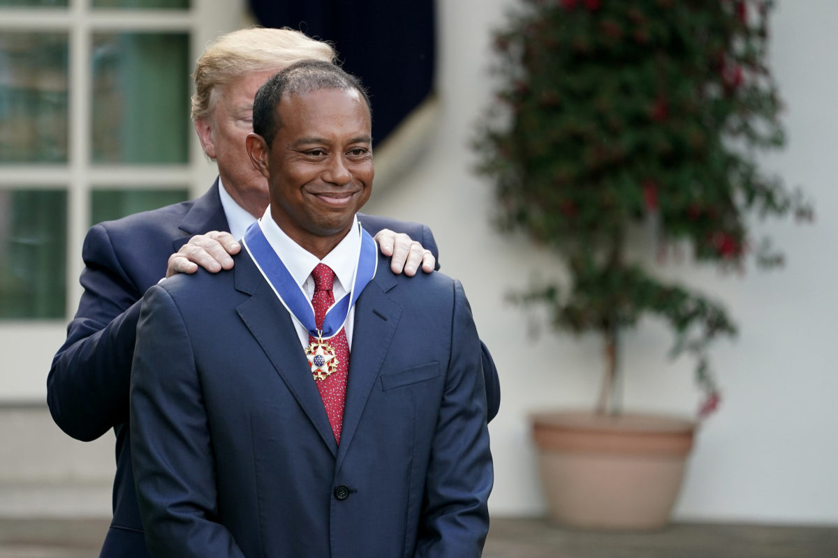 Tiger Woods receives Presidential Medal of Freedom from Donald Trump.