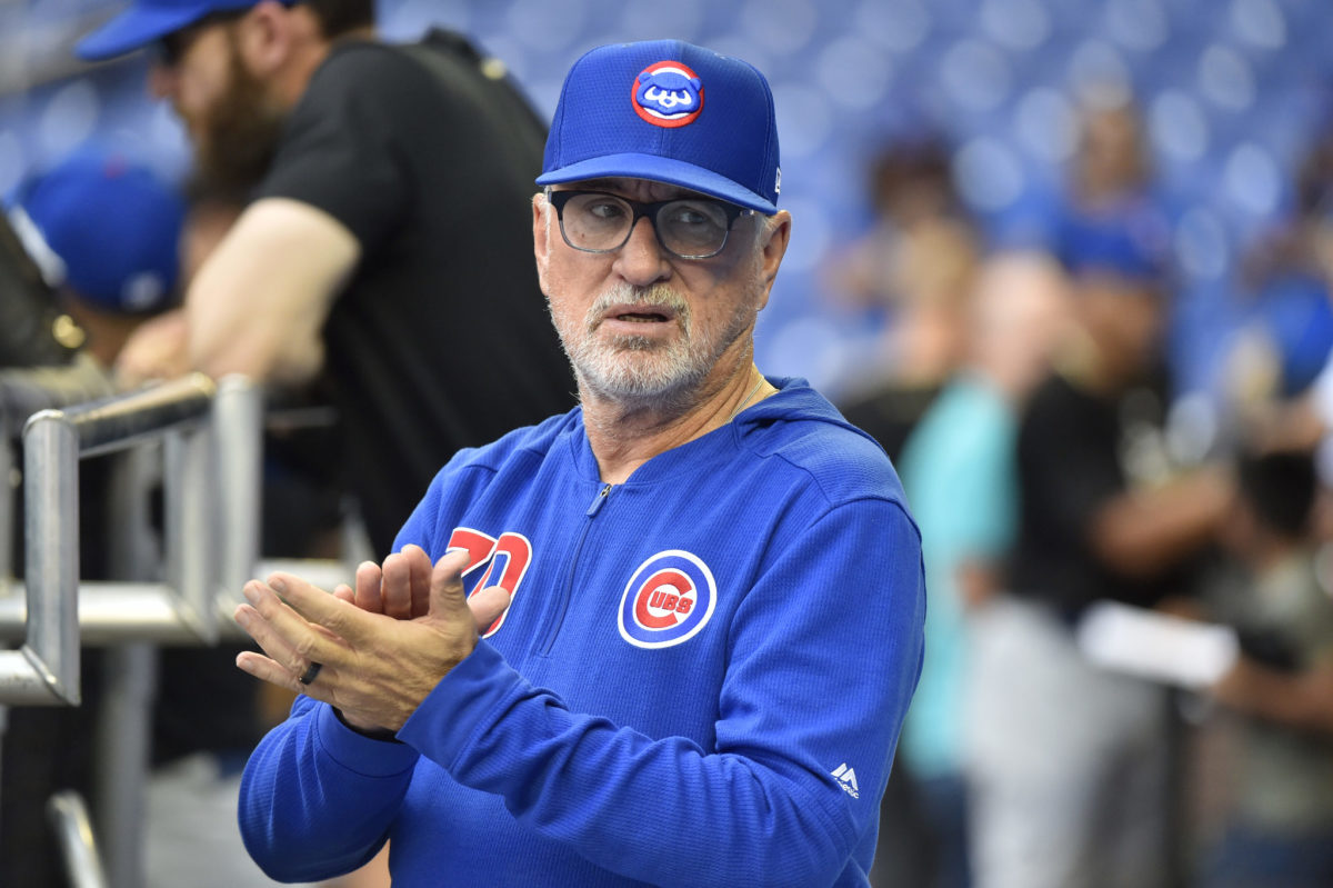 Joe Maddon in the Cubs dugout.