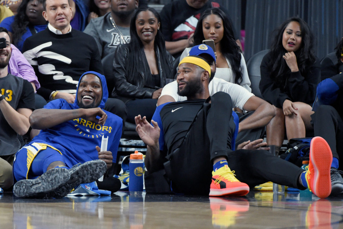 DeMarcus Cousins hangs with Warriors teammate Kevin Durant.