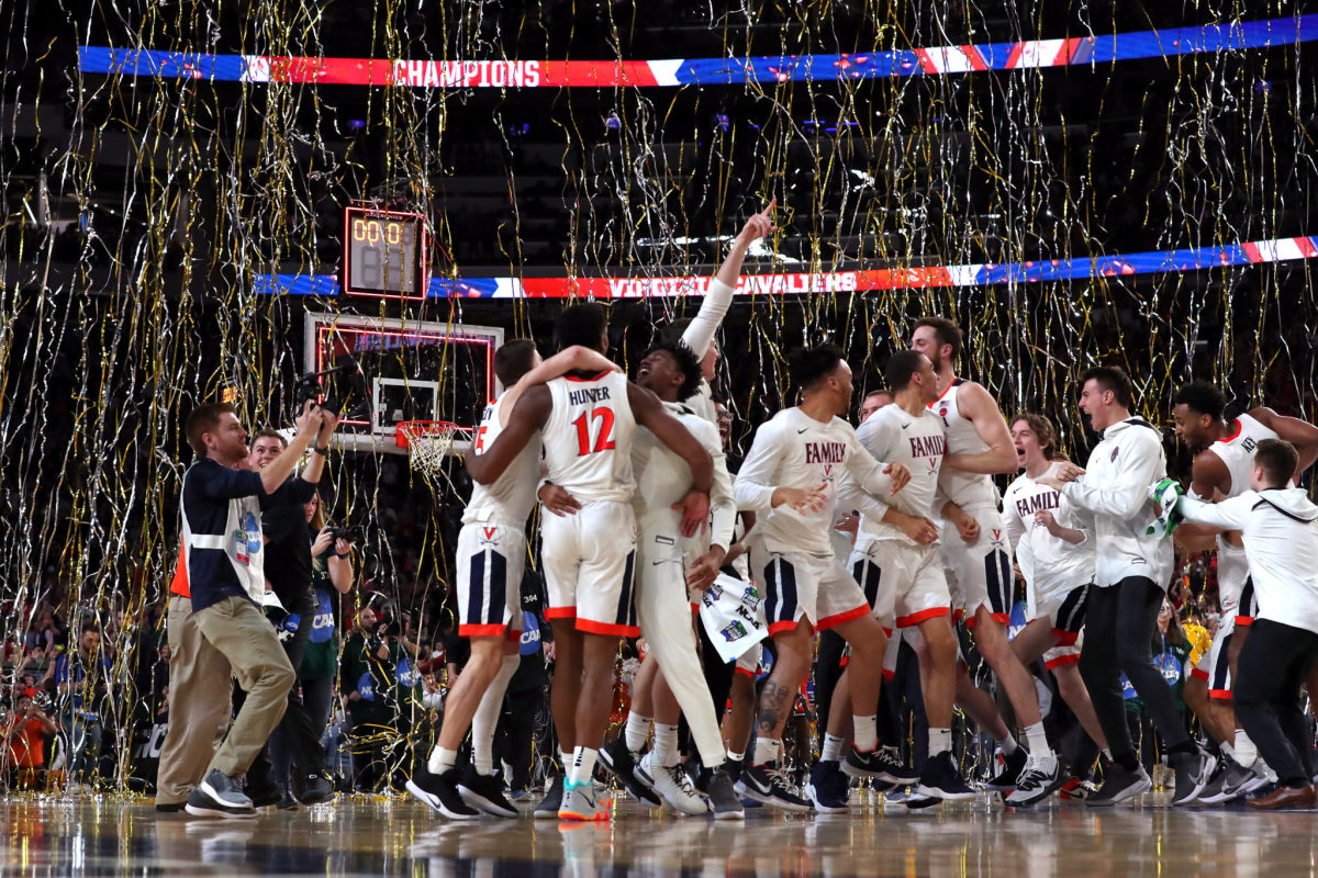 The Virginia Cavaliers celebrating the NCAA Tournament win.