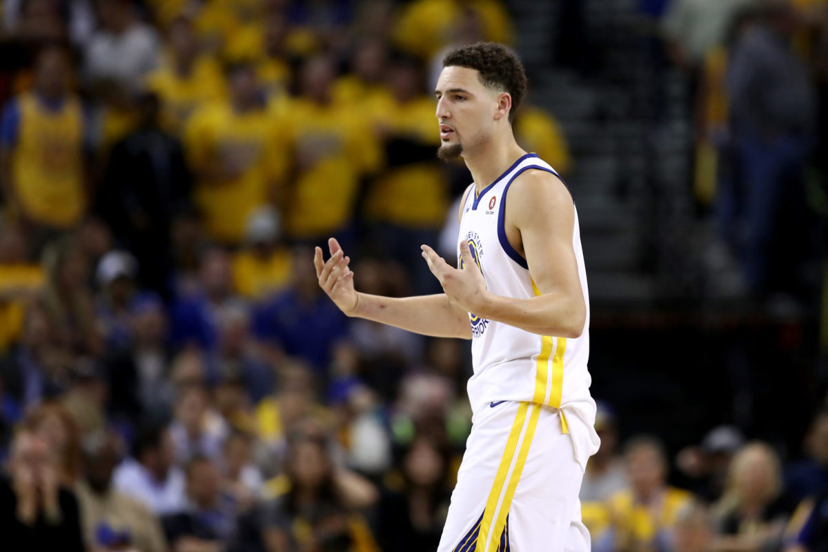 Klay Thompson reacting during a game.