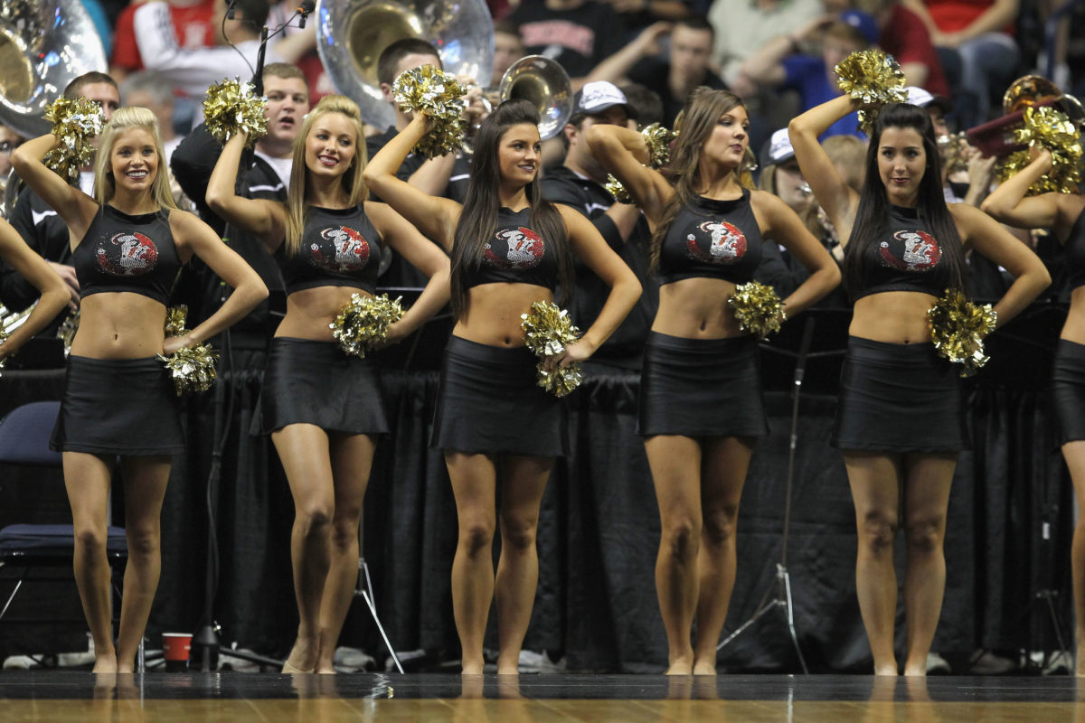 Florida State cheerleaders performing during a basketball game.