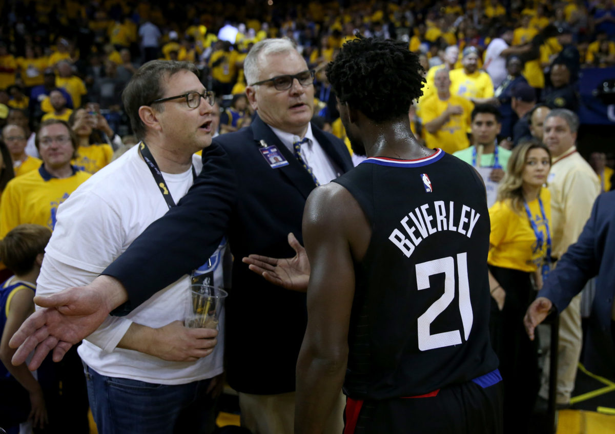 Patrick Beverley arguing with a fan.