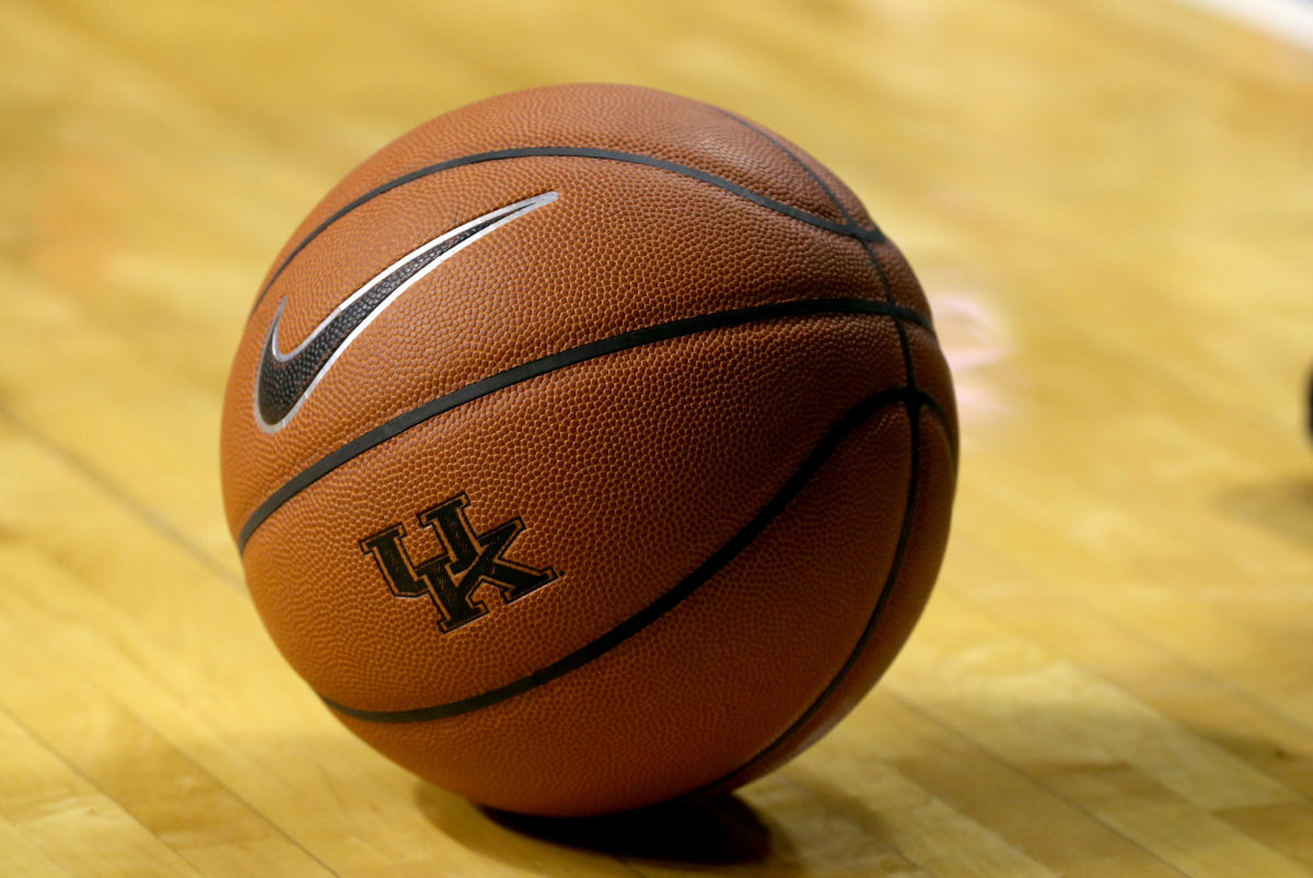 A closeup of a Nike basketball with Kentucky's logo on it.