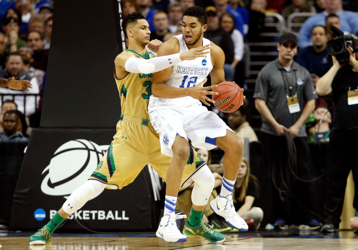 Karl-Anthony Towns and Zach Auguste battle in the post as Kentucky and Notre Dame play during 2015 NCAA Tournament.