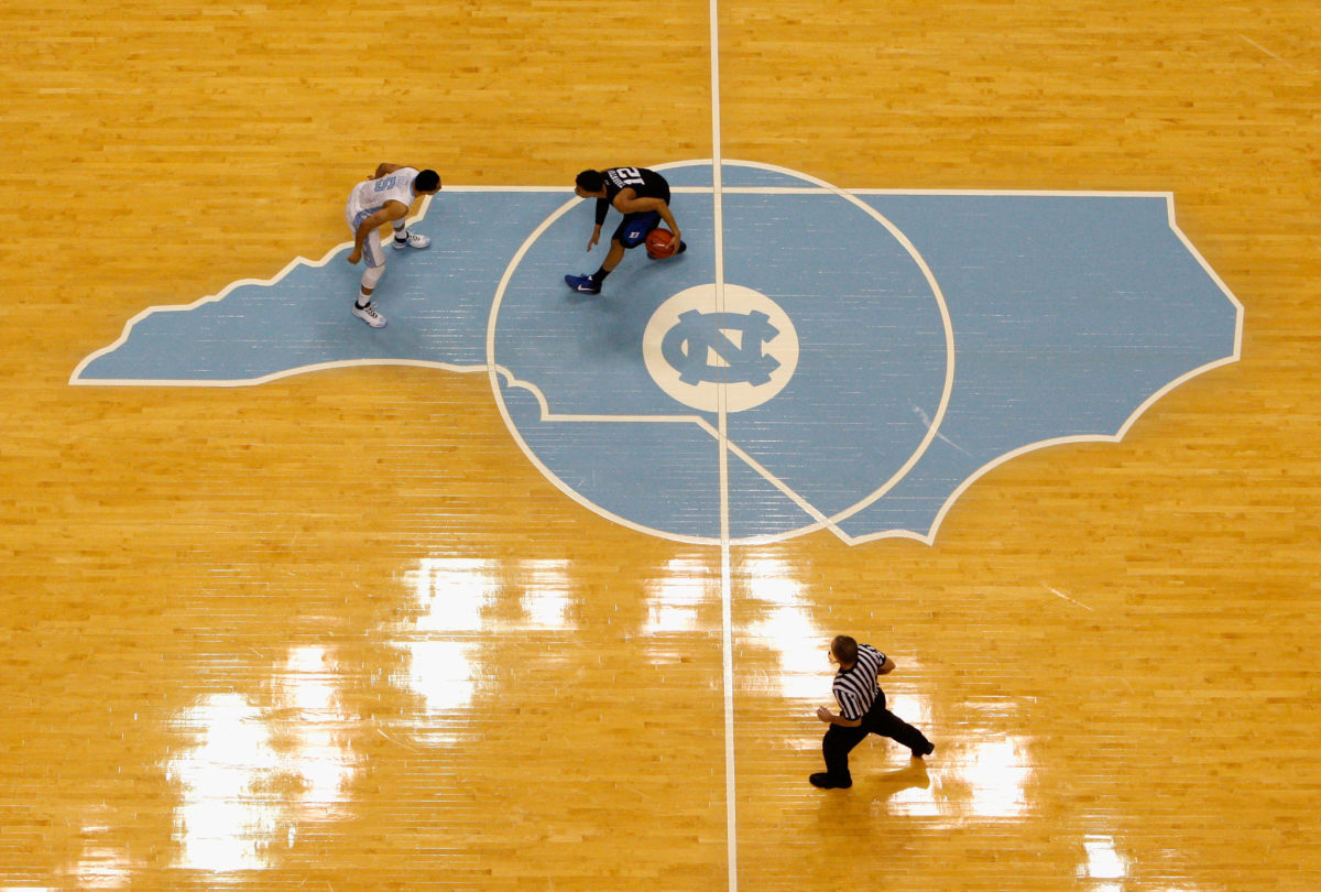 A basketball game being played between Duke and UNC.