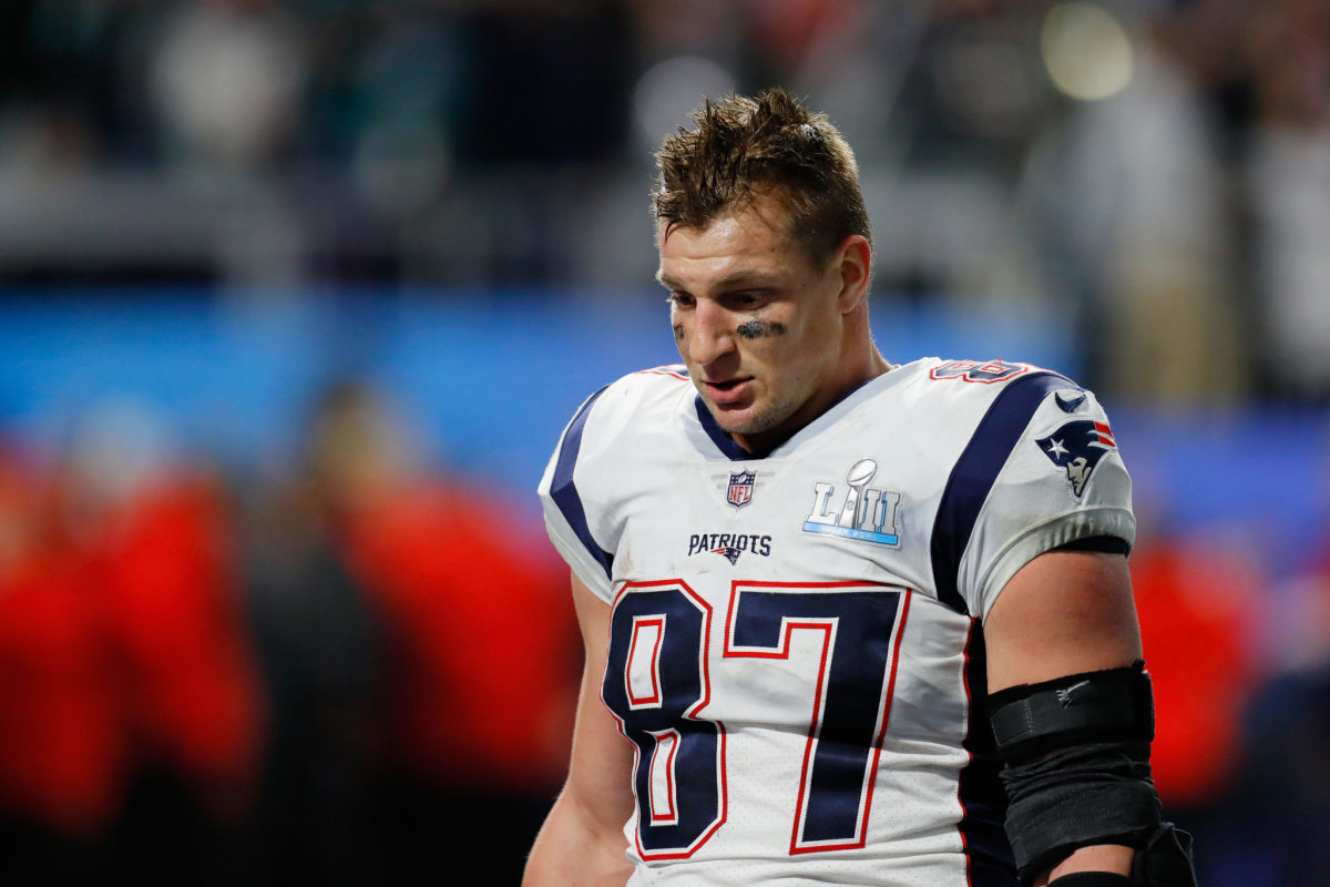 Rob Gronkowski walks off the field after Super Bowl loss to the Patriots.
