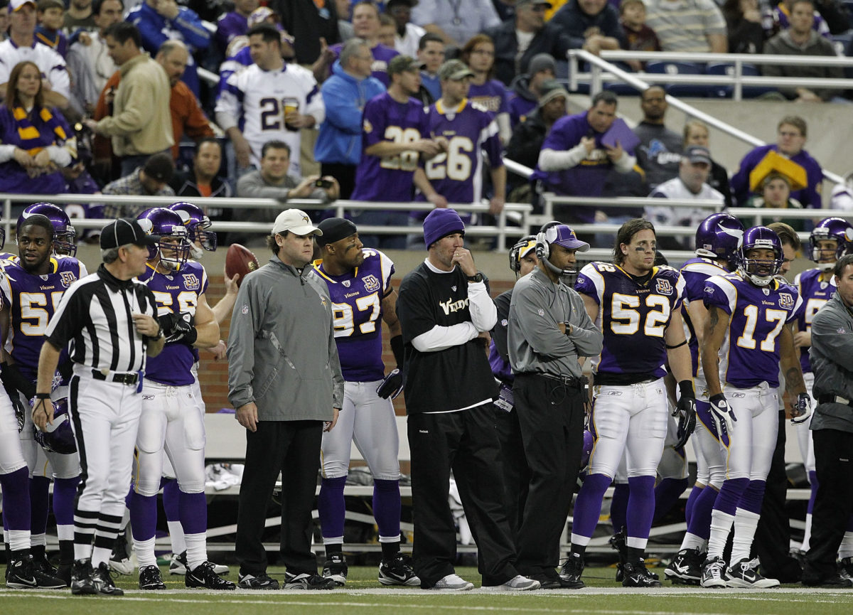 DETROIT - DECEMBER 13: Brett Favre #4 of the Minnesota Vikings watches the game from the sidelines during the game against the New York Giants on December 13, 2010 in Detroit, Michigan.  (Photo by Leon Halip/Getty Images)