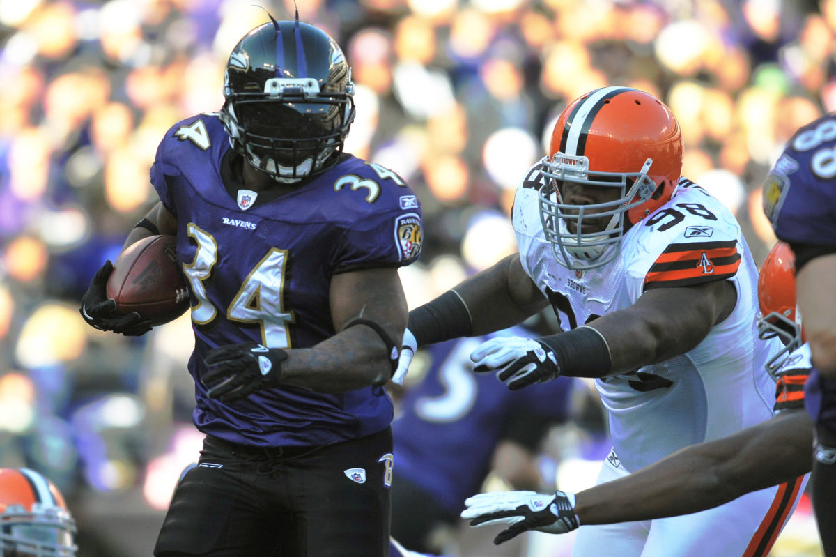 BALTIMORE, MD - DECEMBER 24:  Ricky Williams #34 of the Baltimore Ravens runs the ball against the Cleveland Browns at M&amp;T Bank Stadium on December 24. 2011 in Baltimore, Maryland. The Ravens lead the Browns 17-0 at the half. (Photo by Larry French/Getty Images)