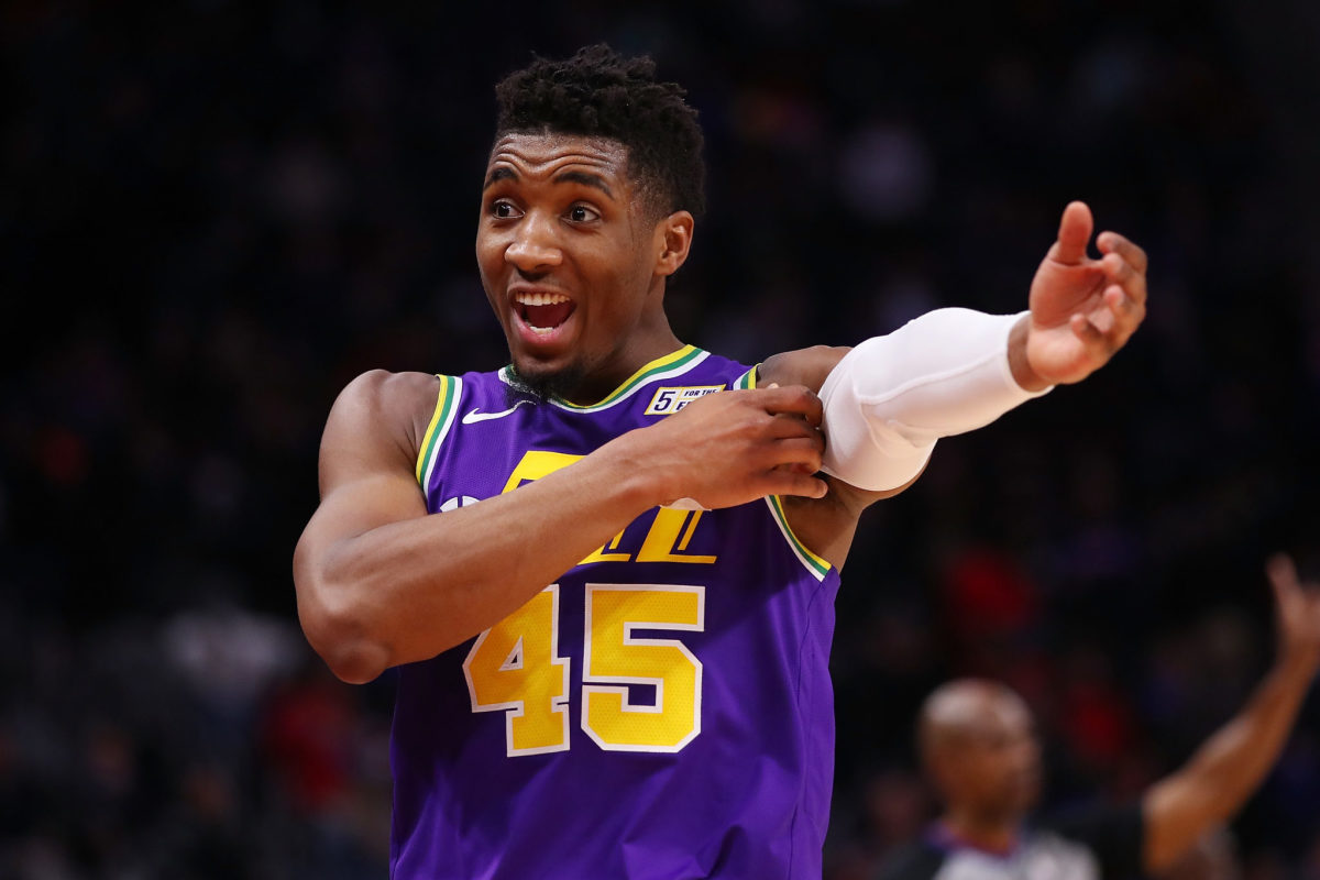 Donovan Mitchell adjusting his sleeve during a game.
