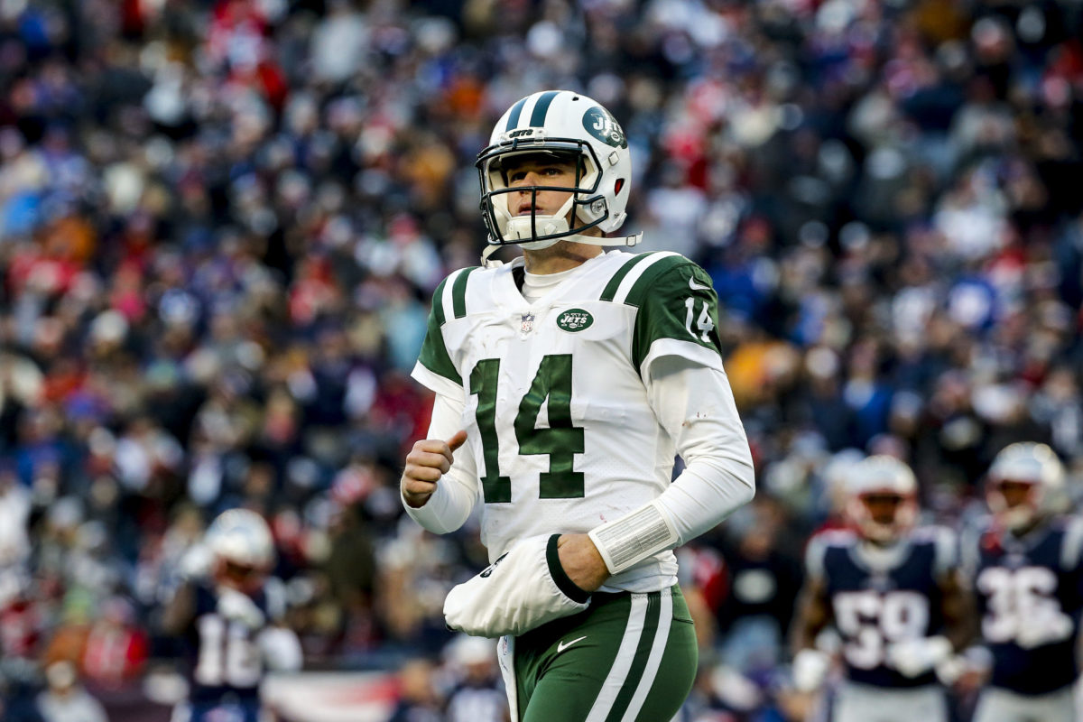 A closeup of Sam Darnold during a New York Jets game.