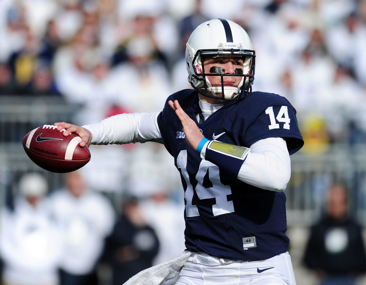 Christian Hackenberg winds up to throw.