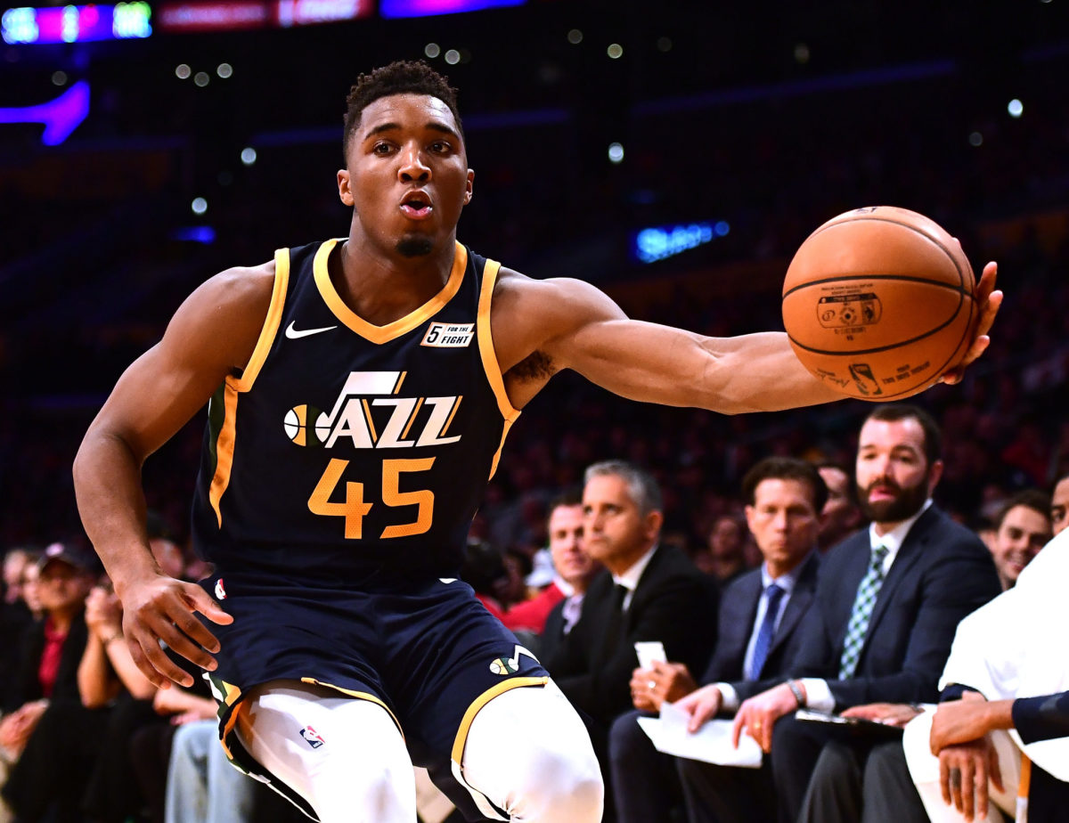 Donovan Mitchell with the basketball in his left hand.