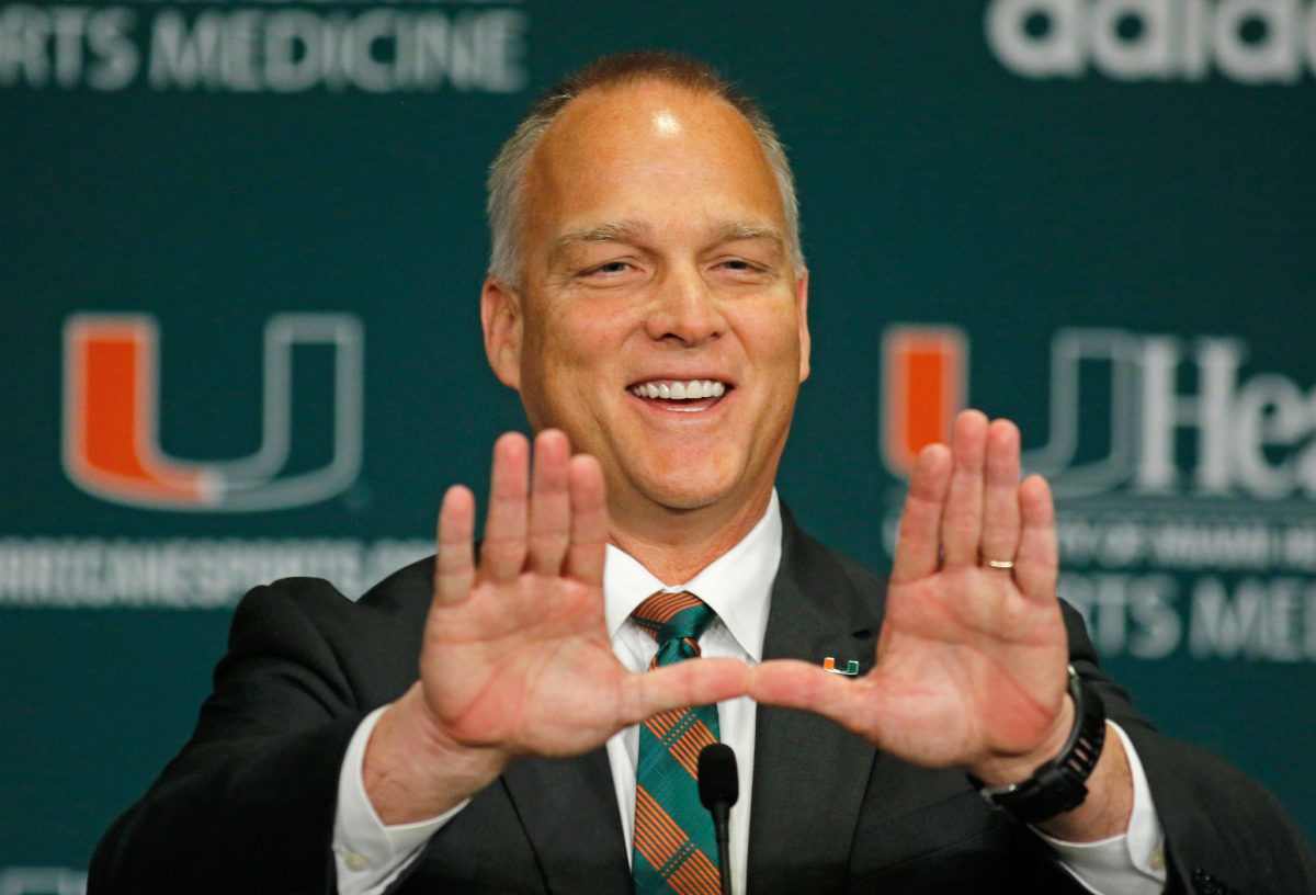 Mark Richt throws up the U at his intro press conference.