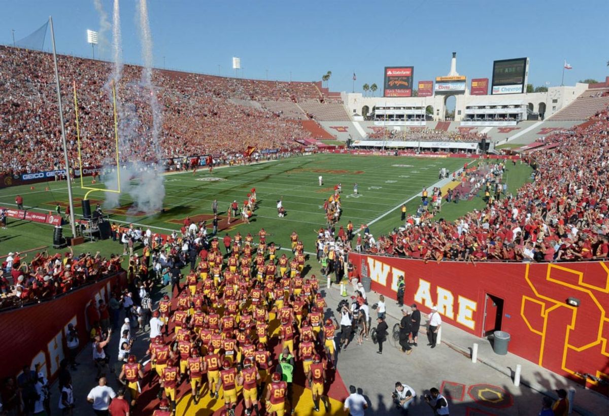 USC football players running onto the field.
