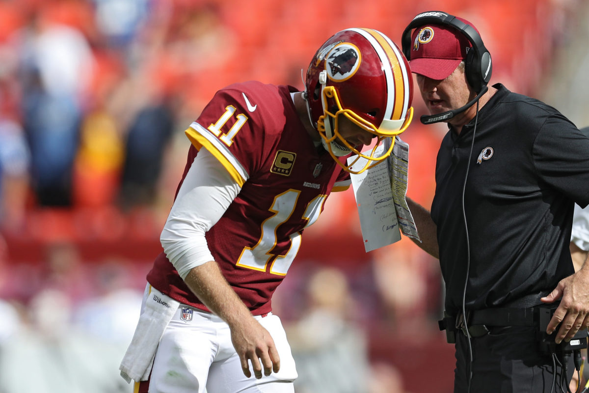 Jay Gruden discusses a play with Alex Smith.