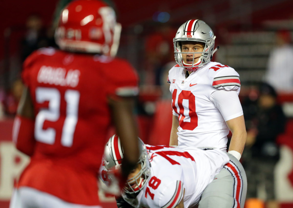 Quarterback Joe Burrow of the Ohio State Buckeyes calls out signals during a game against the Rutgers Scarlet Knights.