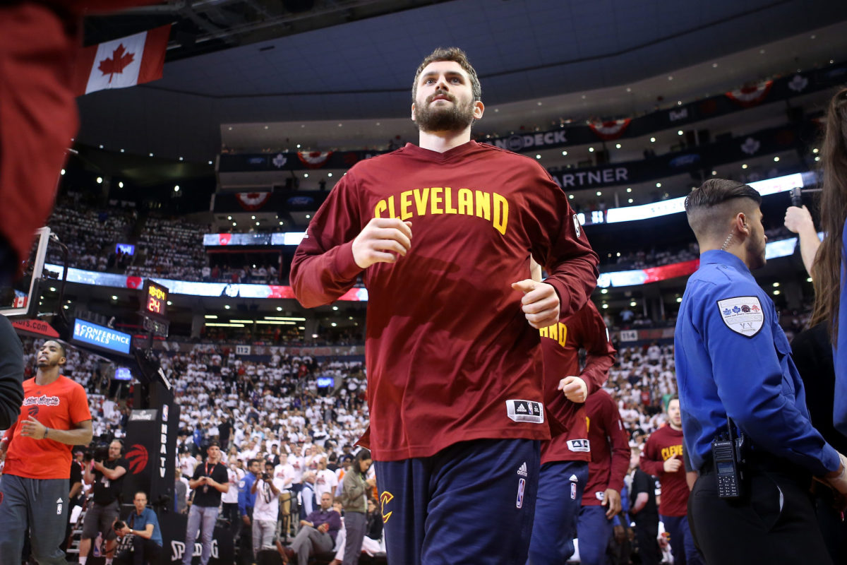 kevin love runs onto the court during a game for the cleveland cavaliers
