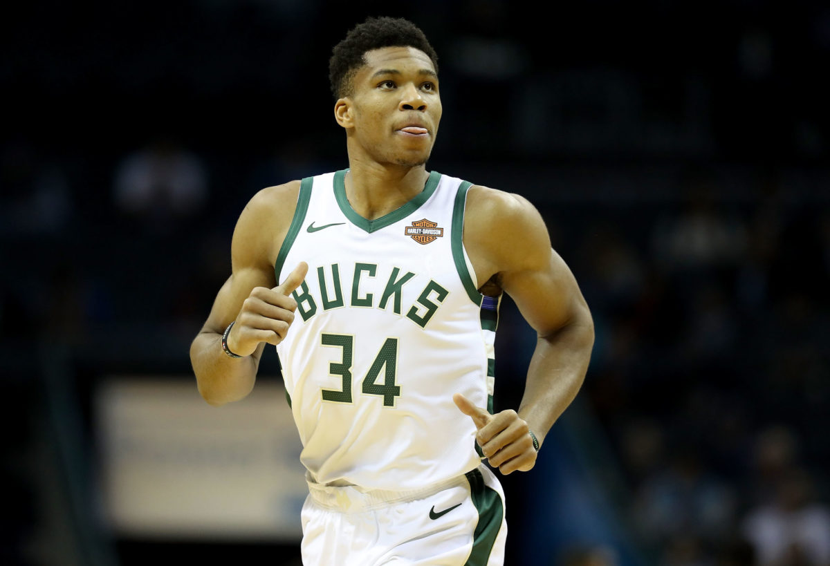 Giannis Antetokounmpo of the Milwaukee Bucks unning up the court during a game.