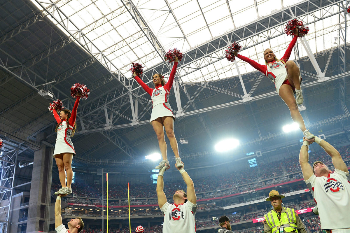 Ohio State cheerleaders performing during a game.