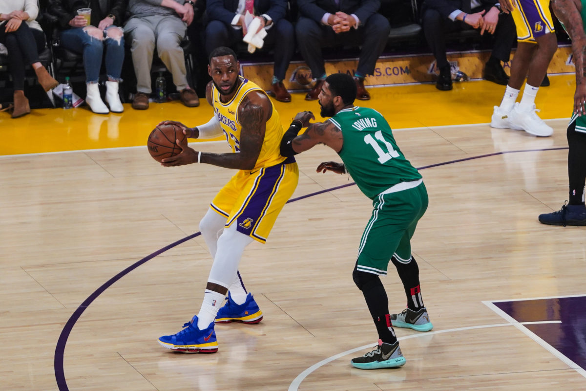 LeBron James and Kyrie Irving on the court.