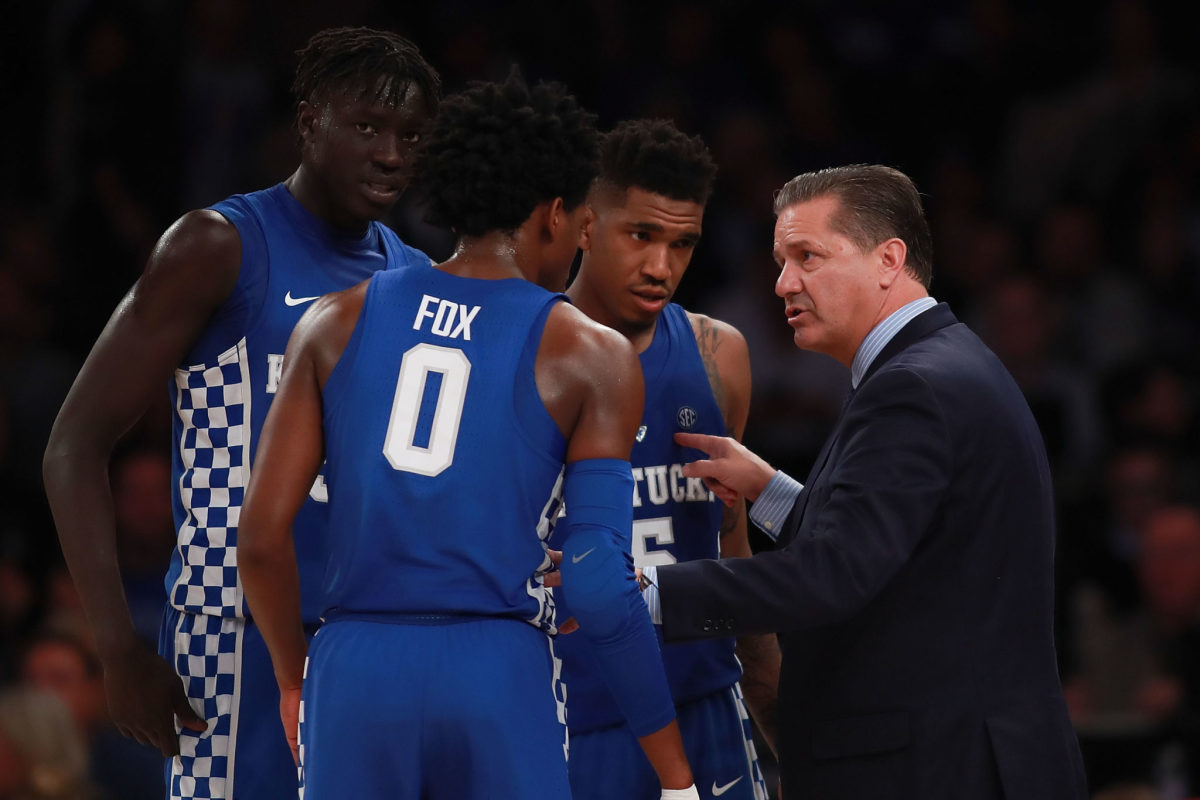 Coach Cal talking to his Kentucky players.