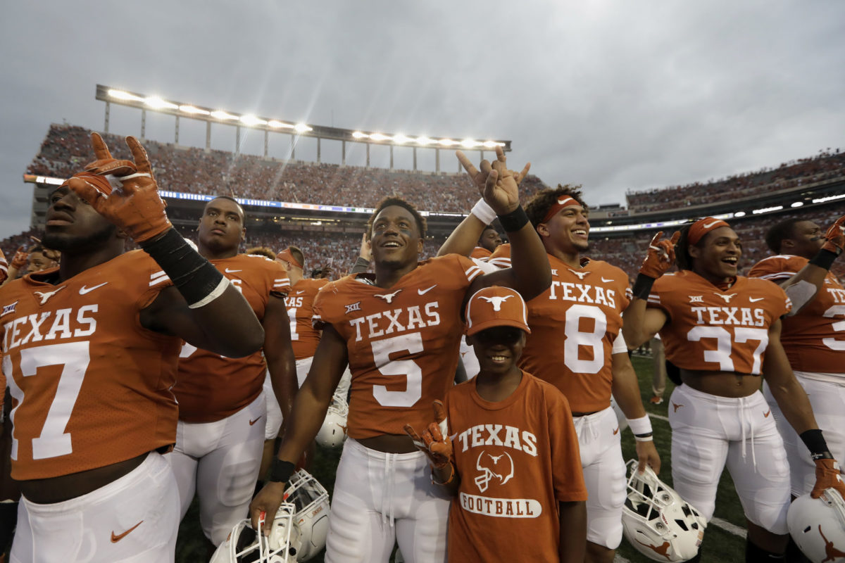 Casey Thompson and the Texas Longhorns celebrate a win.