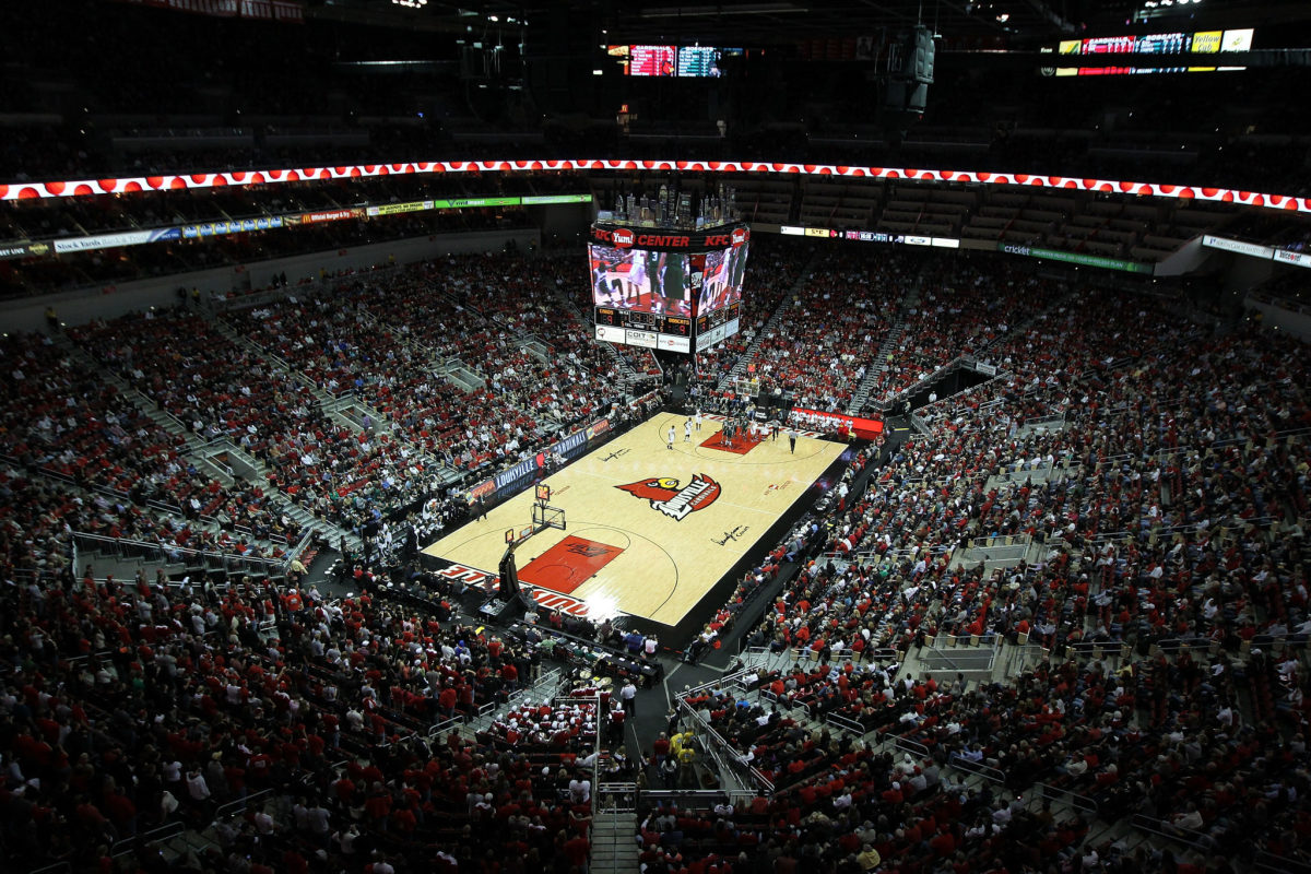 An aerial shot of Louisville's basketball court during a contest.