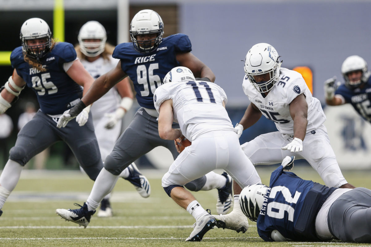 Rice DT Zach Abercrumbia pursues an opposing player.
